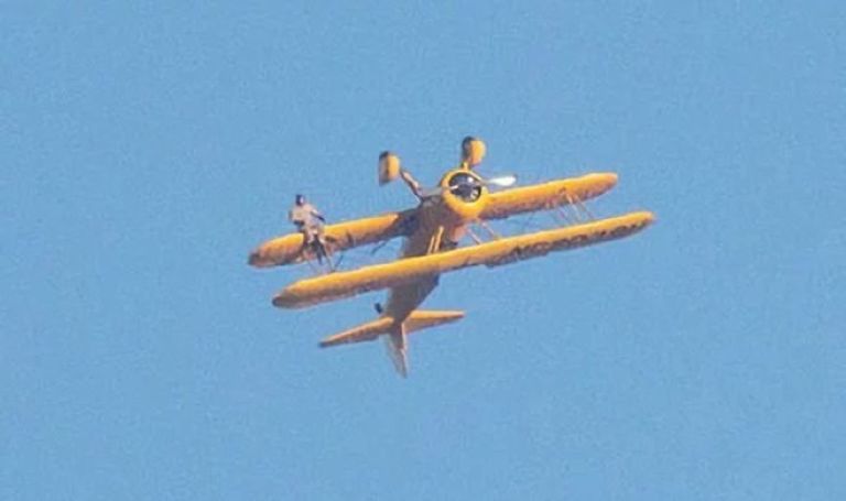 173 094948 tom cruise hangs upside down biplane 2