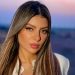 أمل غربي تهدي الإمارات أغنية عيد الخير في اليوم الوطني